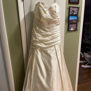 Size 12, ivory, sweetheart A line wedding gown from David’s Bridal.
